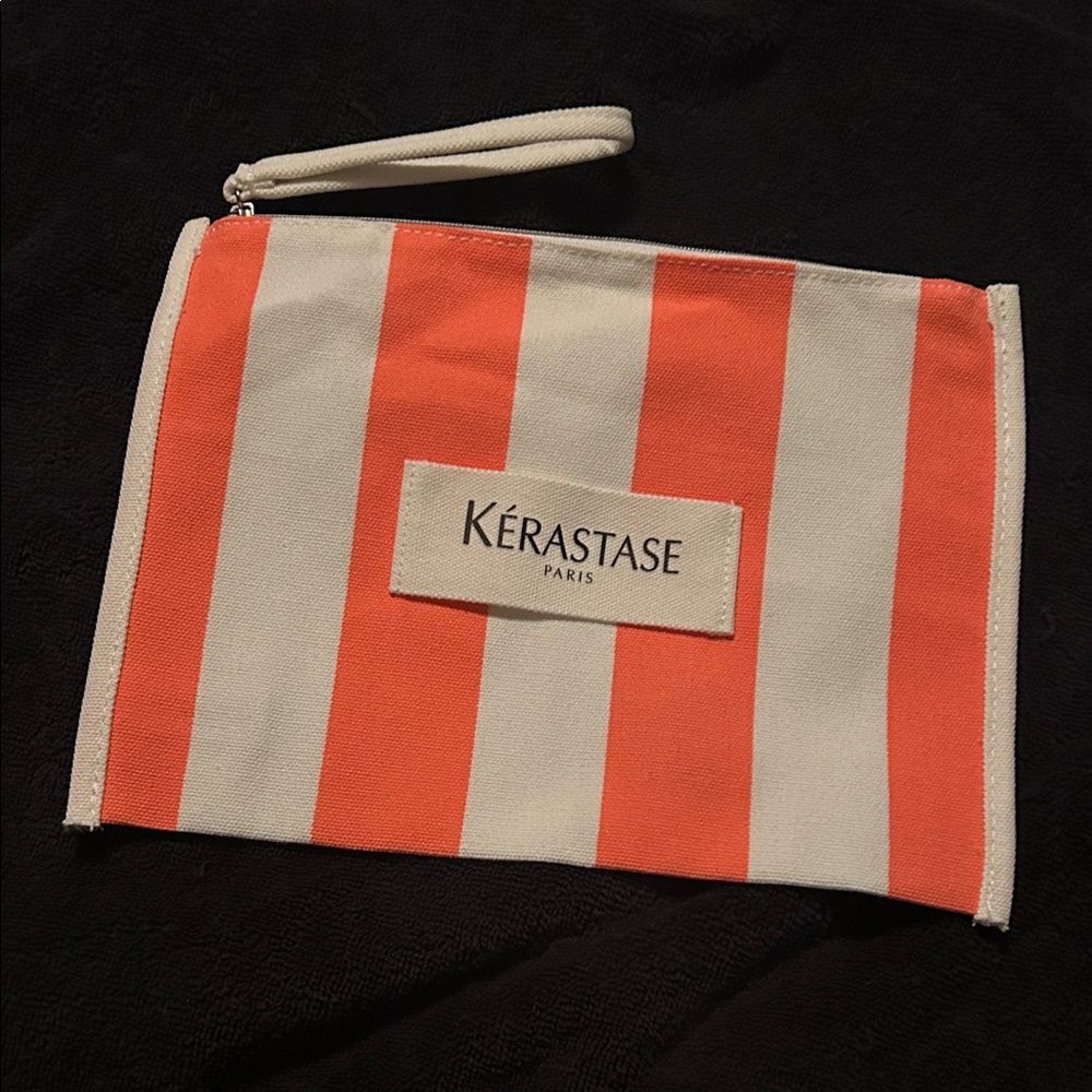Kérastase Orange and White Striped Pouch